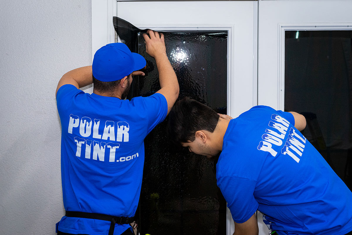 Anti-shatter security commercial window film holding storefront glass together after a smash attempt on a Summerlin retail location