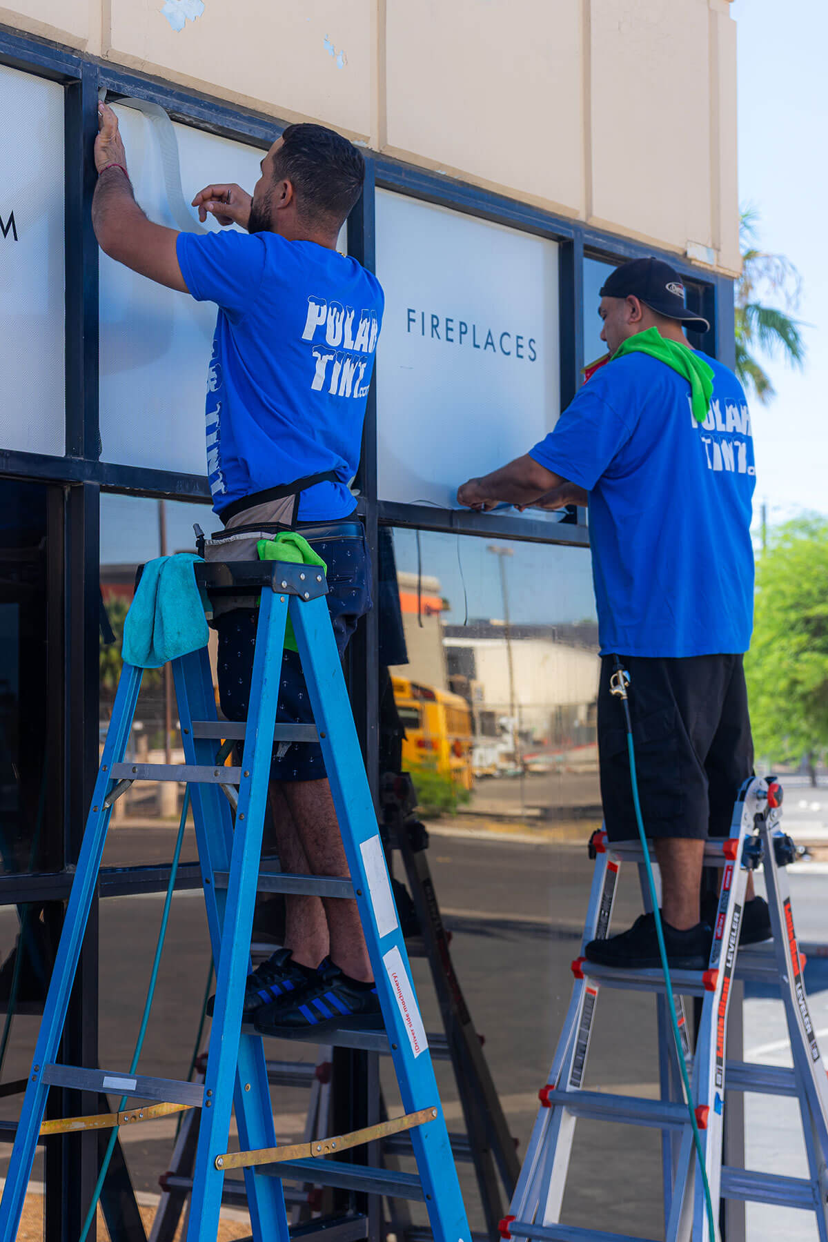 Custom cut-vinyl door logos and racing stripes installed on a Summerlin work truck by Polar Tint
